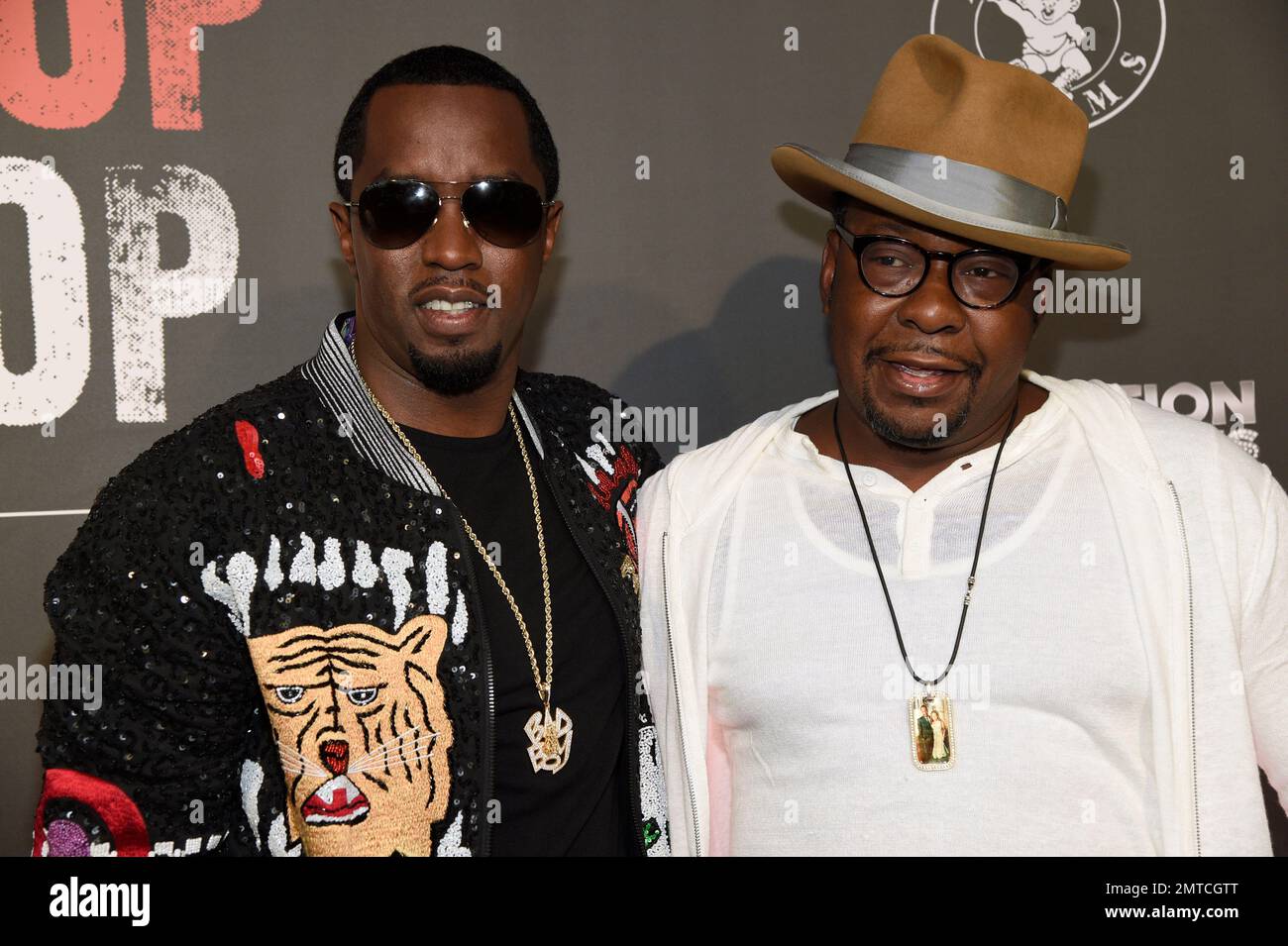 Sean "Diddy" Combs, left, and Bobby Brown arrive at the Los Angeles