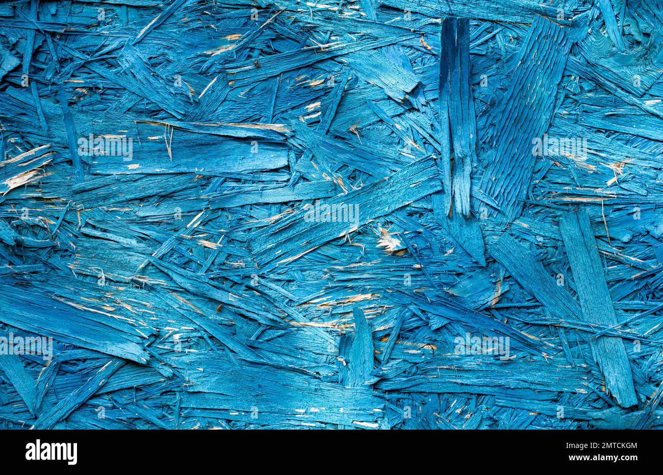 OSB plate is blue. Abstract texture of building material Made of