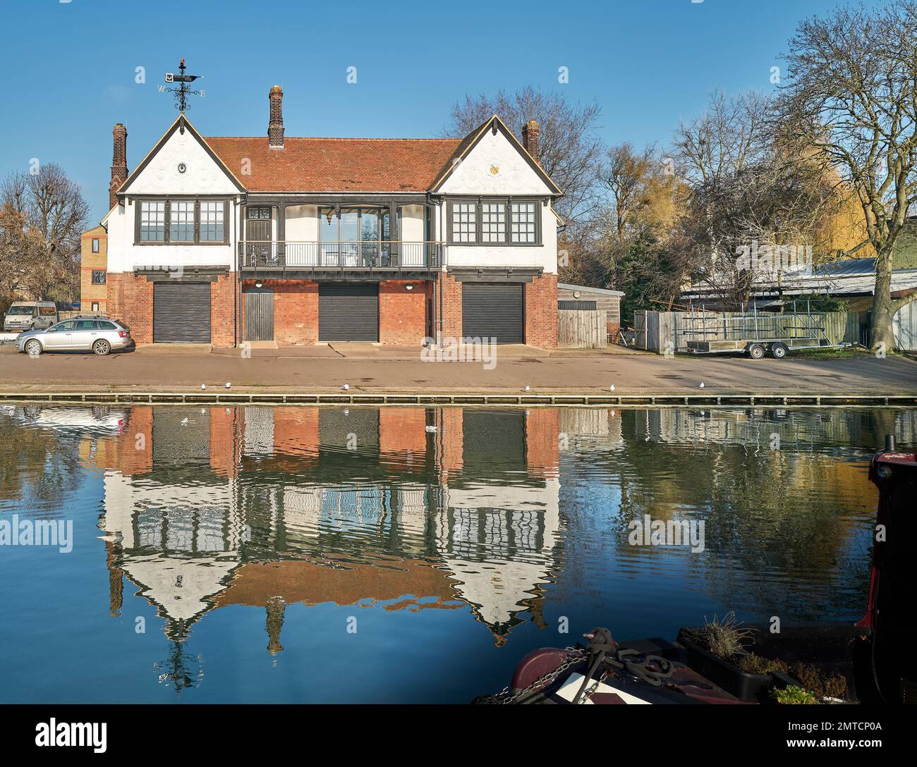 University of Cambridge, Trinity Hall college, boat club house at a bank of the river Cam, Cambridge, England, on a sunny winter day. Stock Photo