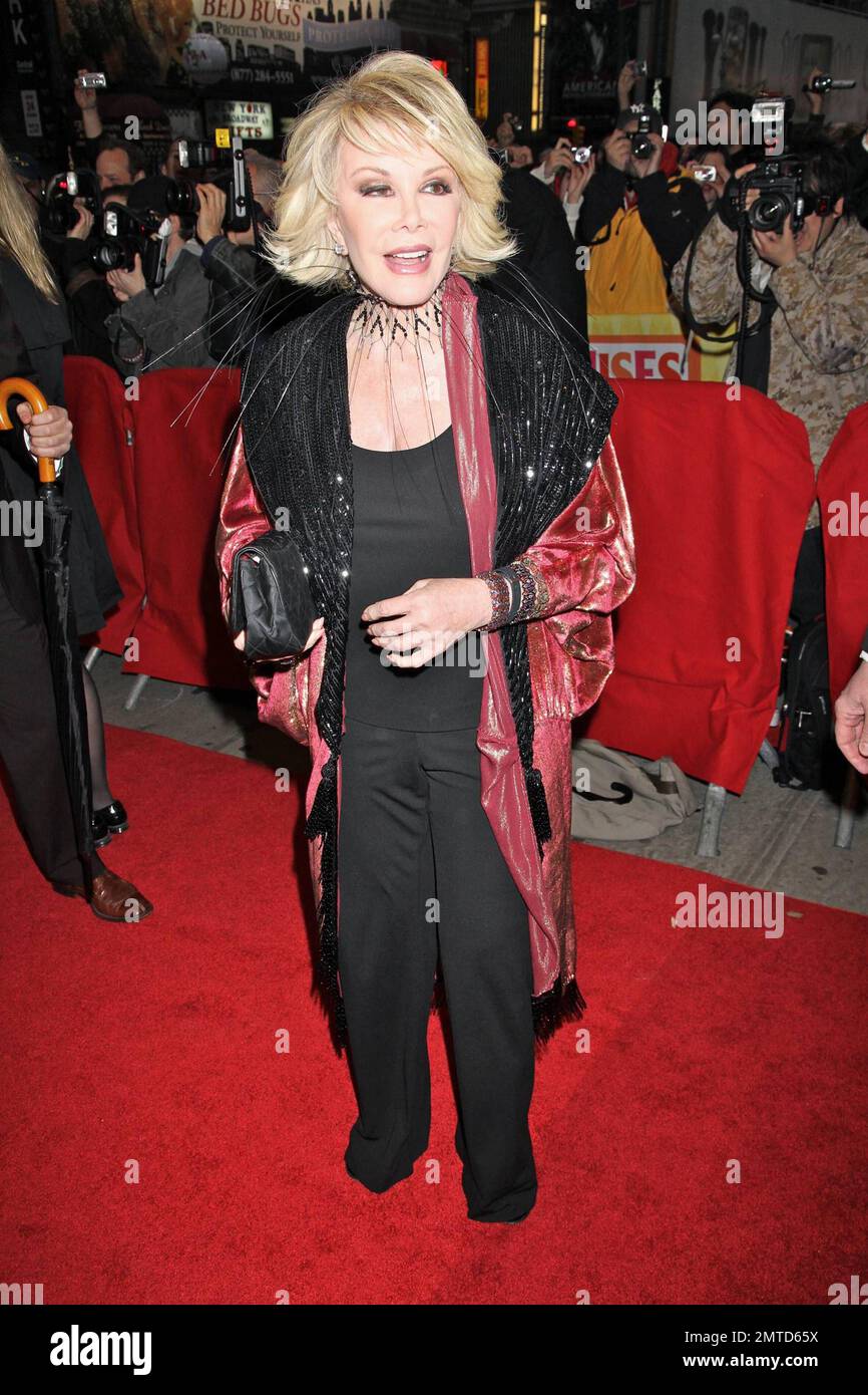 Joan Rivers walks the red carpet at the premiere of the Broadway
