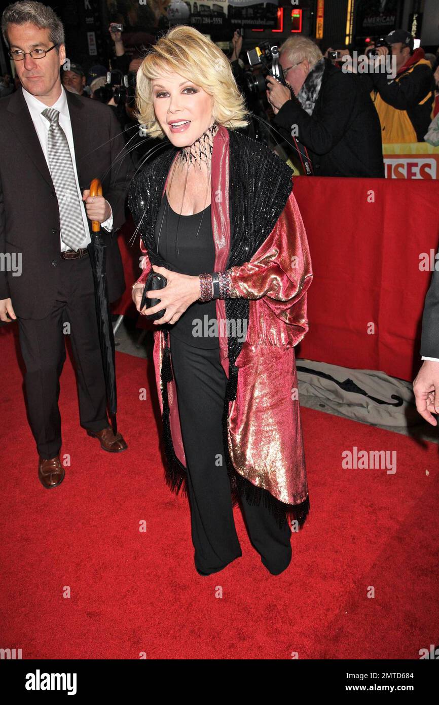 Joan Rivers walks the red carpet at the premiere of the Broadway