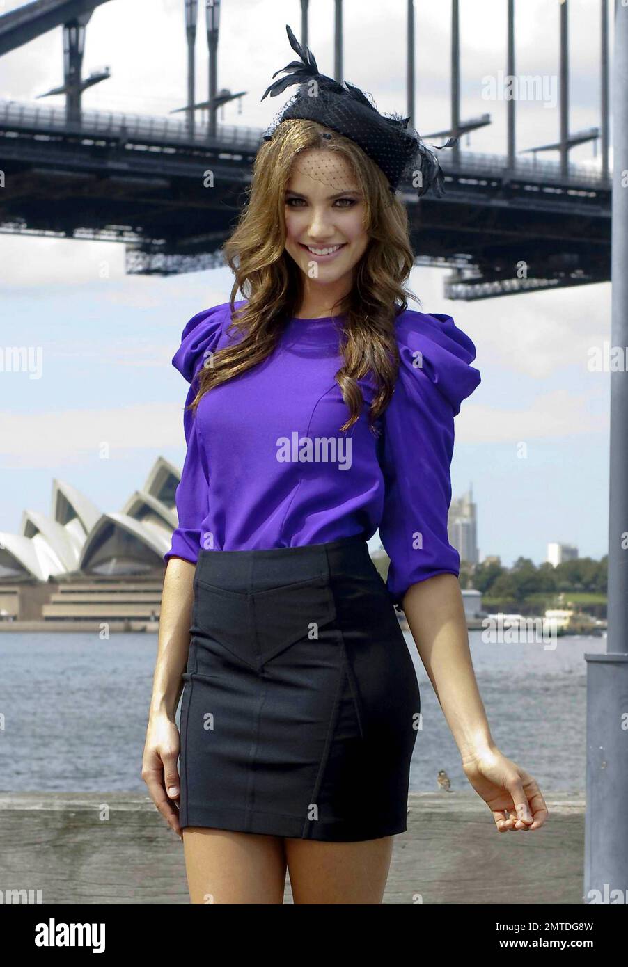 Miss Universe Australia 2009 and third runner up for the 2009 Miss Universe title Rachael Finch poses for photos with the iconic Sydney Opera House in the background. Sydney, Australia. 3/15/10.   . Stock Photo