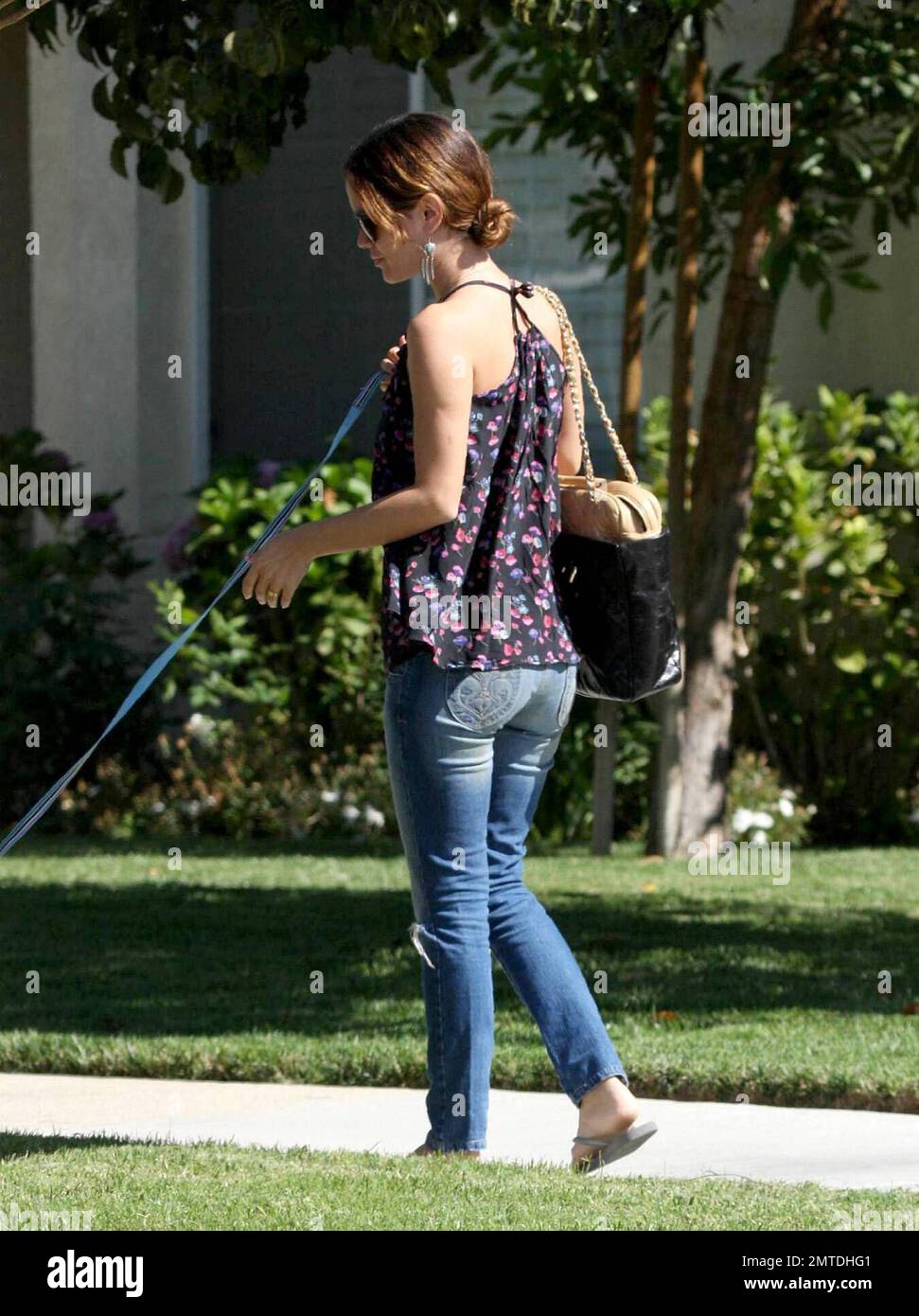 Exclusive!! Rachel Bilson was seen attending a luncheon with family and friends in a suburban Los Angeles neighborhood today.  She had her dog Thurmen Murmen along for the ride.  Speculation persists about the status of Rachel's relationship with actor Hayden Christensen and whether the two are engaged.  Los Angeles, CA.  9/8/08. Stock Photo