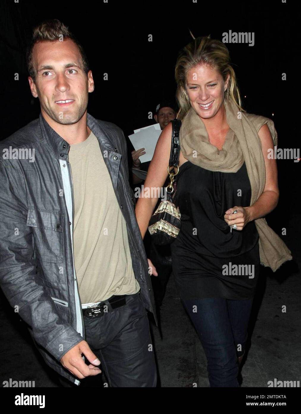 Supermodel Rachel Hunter steps out with her fiance Jarret Stoll to pay