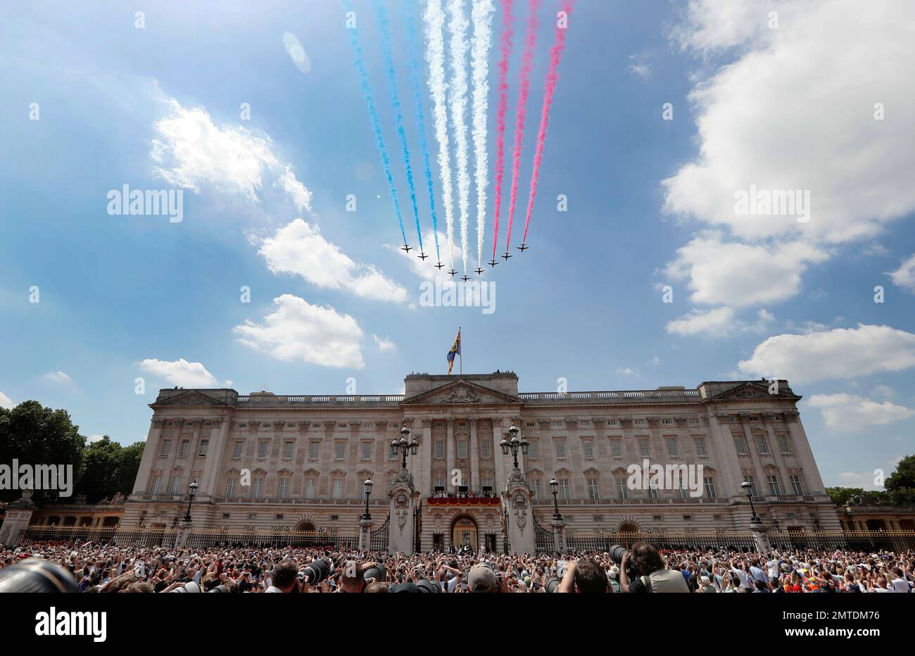 the-red-arrows-fly-past-as-britain-s-royals-watch-from-the-balcony-of
