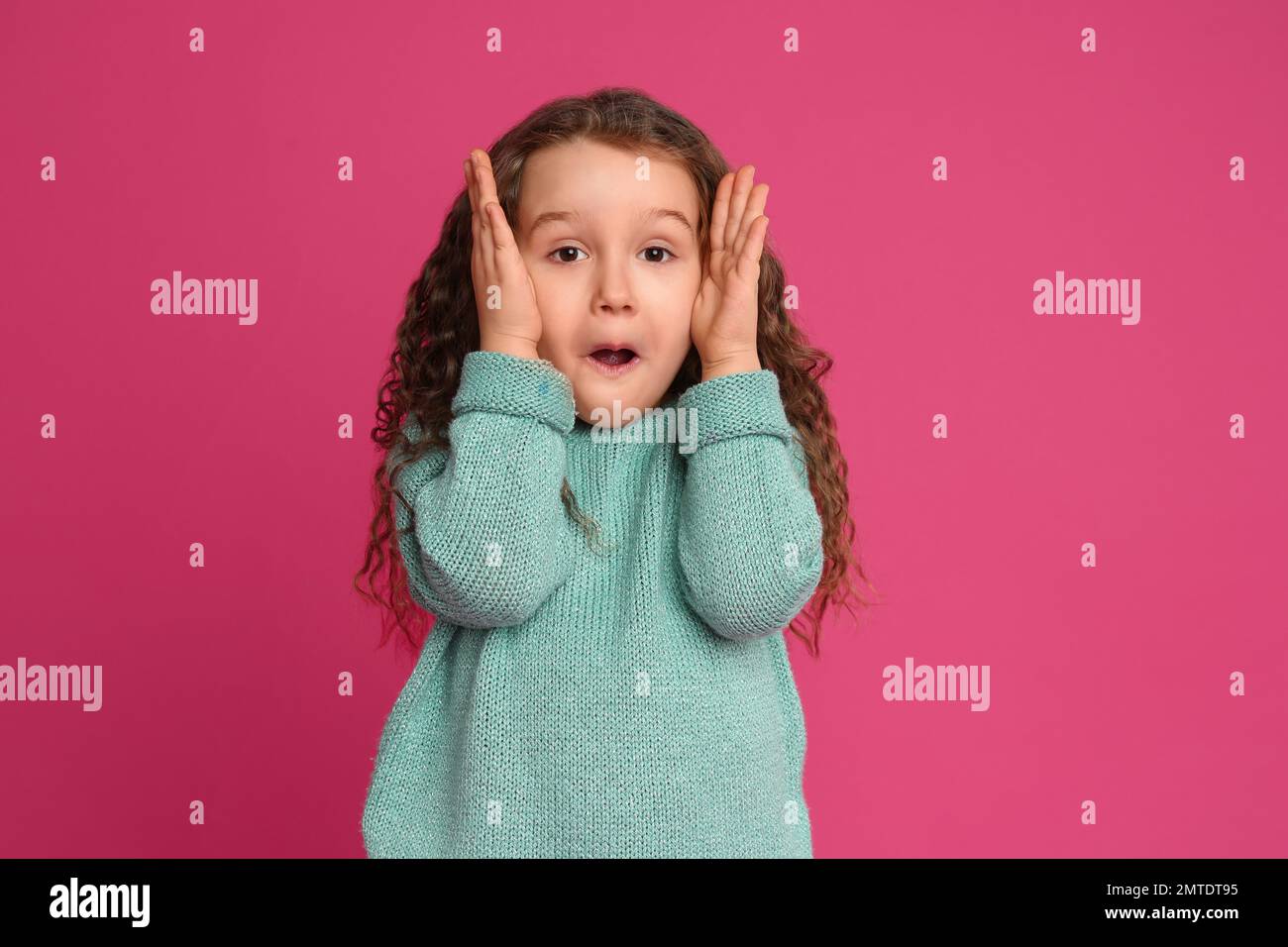 Portrait of cute little girl on pink background Stock Photo - Alamy