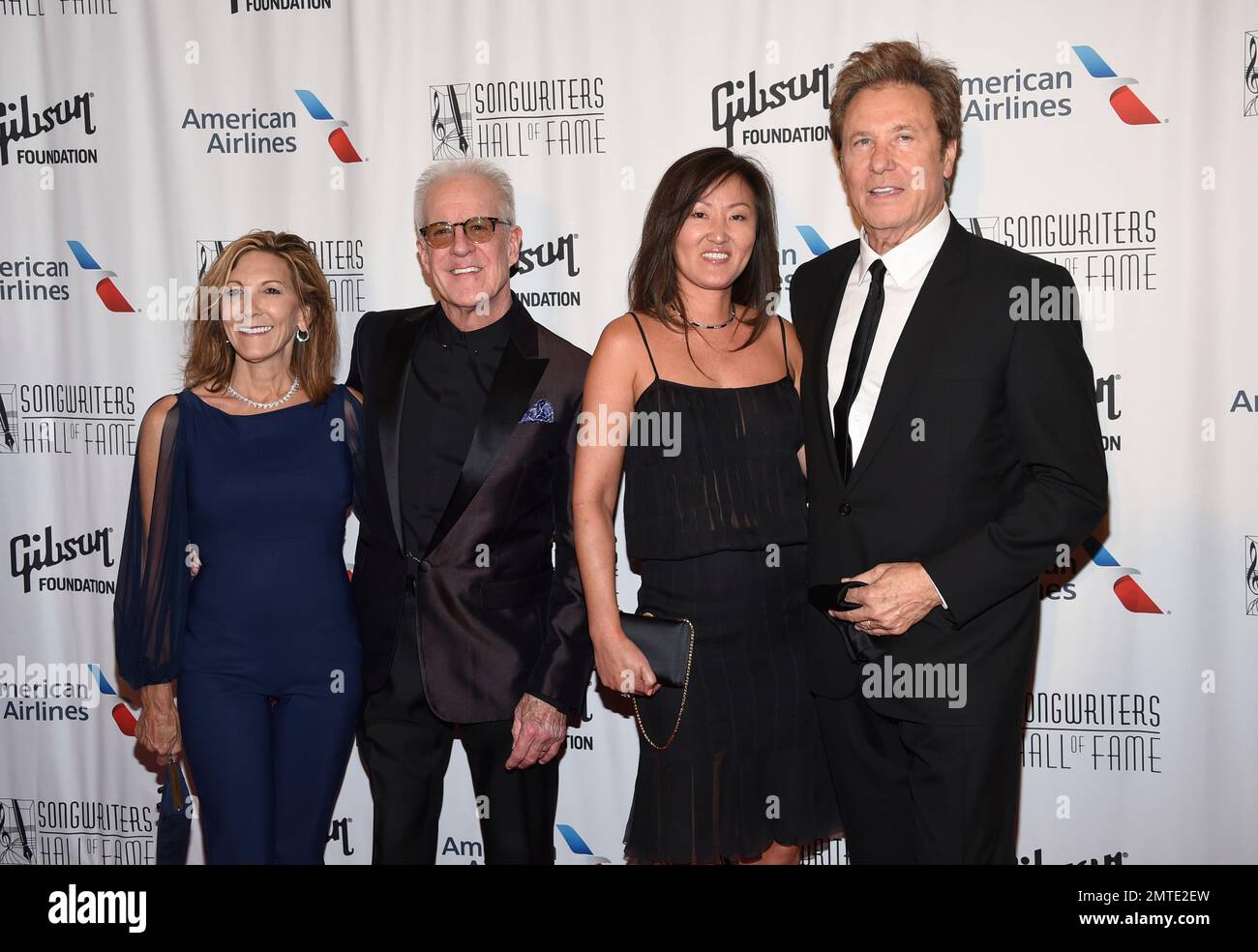Inductee James Pankow of Chicago, second from left, Joy Kopko, and Inductee Robert Lamm of