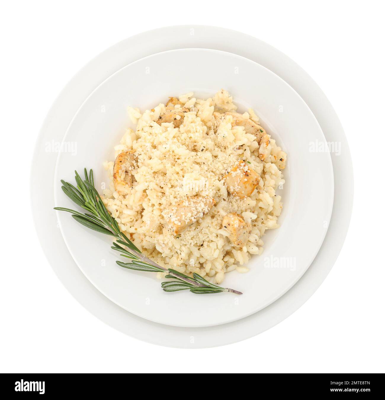 Delicious chicken risotto with rosemary isolated on white, top view ...