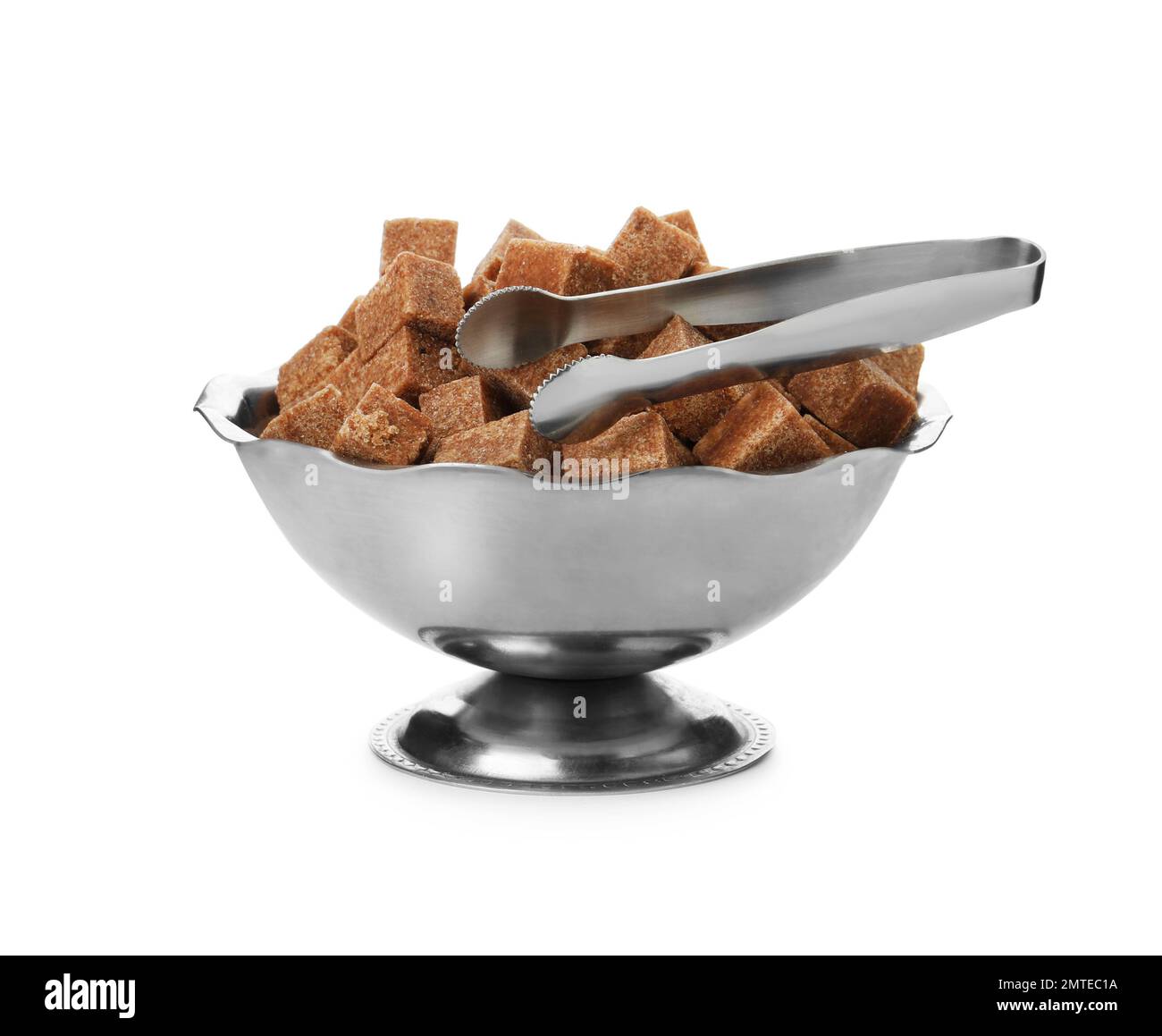 Metal bowl with brown sugar cubes and tongs isolated on white Stock Photo Alamy