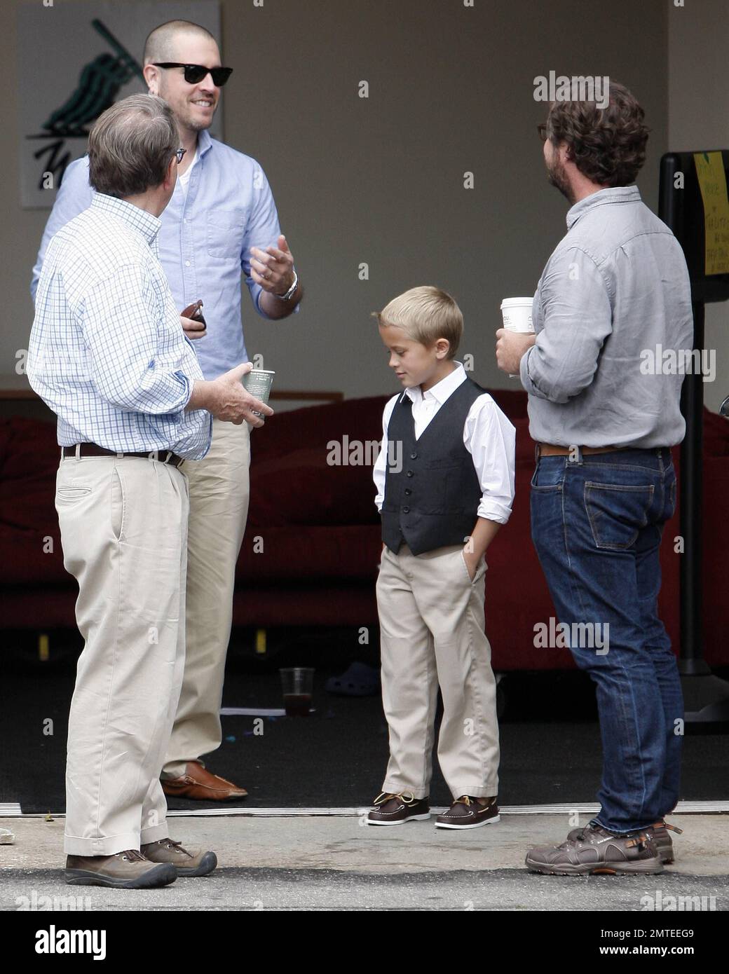 Reese Witherspoon, son Deacon and husband Jim Toth attend church service. Reese smiled for photographers as she left, LA, CA, 06/12/11. Stock Photo