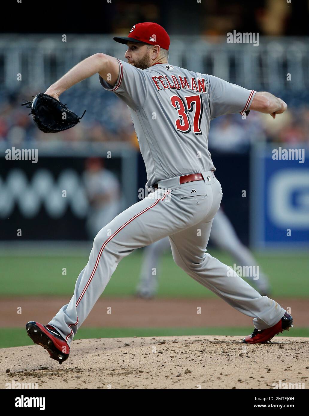 Cincinnati Reds starting pitcher Scott Feldman throws to the plate