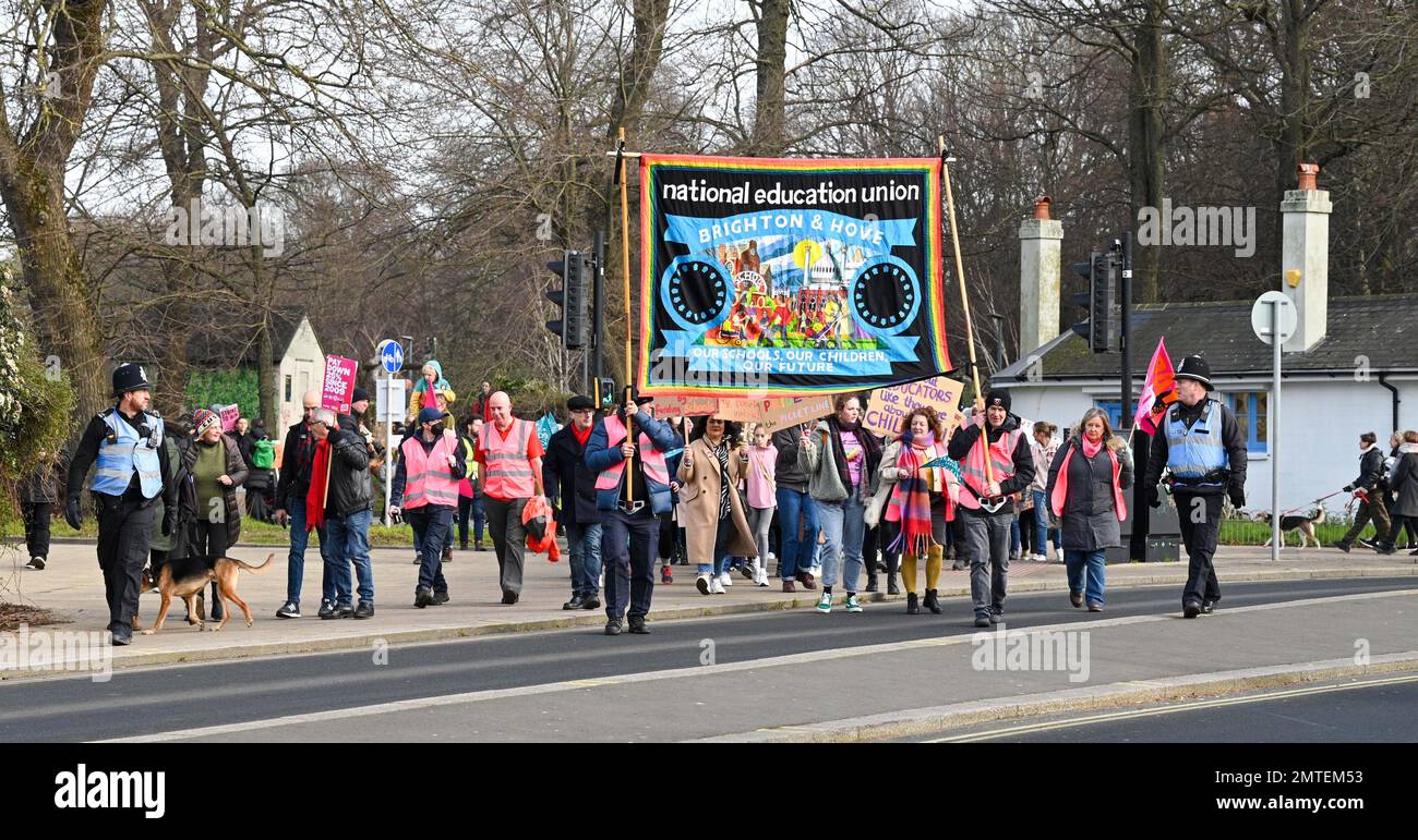 Brighton UK 1st February 2023 - Thousands of teachers and supporters march through Brighton as an expected half a million workers demonstrate throughout Britain today against the government  : Credit Simon Dack / Alamy Live News Stock Photo