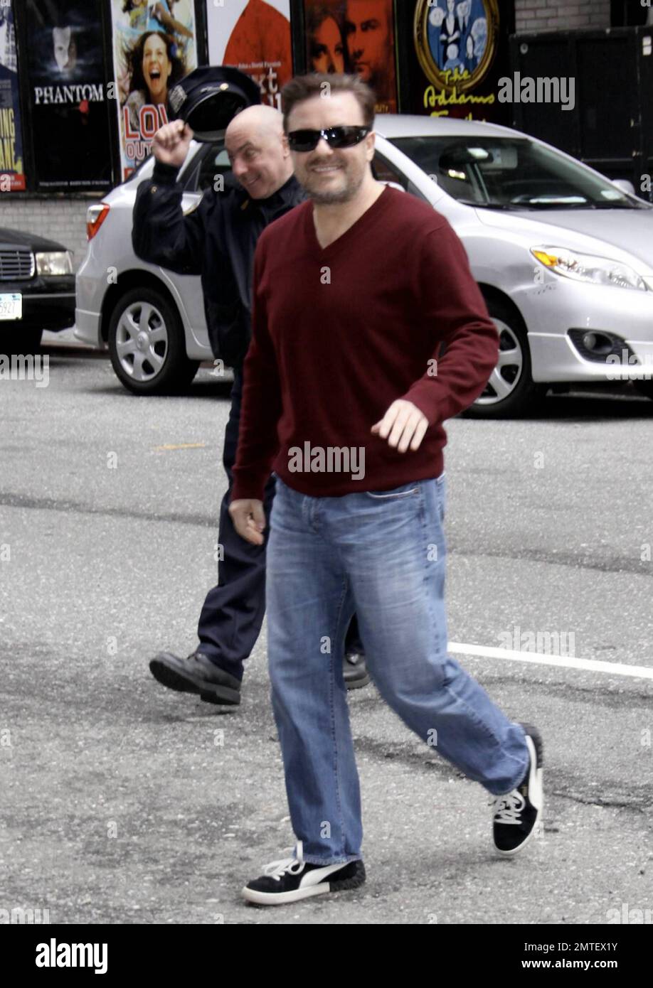 Ricky Gervais is looking remarkably slim while out and about on the streets of New York. The 48-year-old Gervais has been focusing on getting slim and healthy over the last year as his career has skyrocketed. It's reported that, in his audiobook released on iTunes in January, Gervais was critical of overwight people, saying 'I really don't know why a doctor under a hippocratic oath takes the risk of something going badly wrong, sometimes with general anaesthetic, because someone can't be bothered to go for a f---ing run. They have bits sliced off and tied up and sucked out. I want to say to th Stock Photo