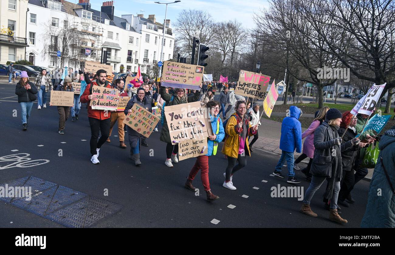 Brighton UK 1st February 2023 - Thousands of teachers and supporters march through Brighton as an expected half a million workers demonstrate throughout Britain today against the government  : Credit Simon Dack / Alamy Live News Stock Photo