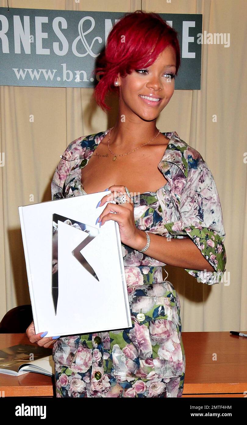 R&B star Rihanna signs copies of her new, self-titled coffee-table book at Barnes & Noble on Fifth Avenue. The book, released last month, features never-before-seen photos of the superstar during the making of her last album 'Rated R.' New York, NY. 10/27/10. Stock Photo
