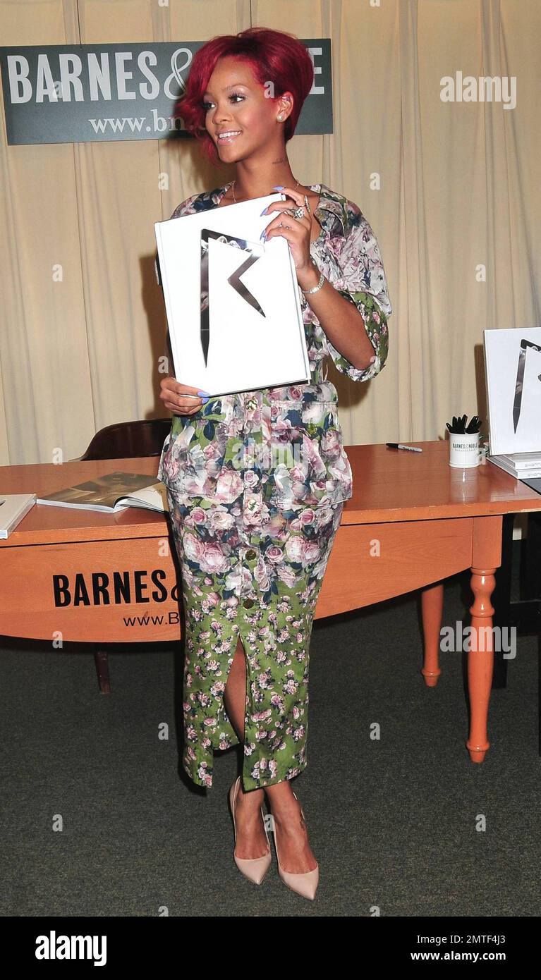 R&B star Rihanna signs copies of her new, self-titled coffee-table book at Barnes & Noble on Fifth Avenue. The book, released last month, features never-before-seen photos of the superstar during the making of her last album 'Rated R.' New York, NY. 10/27/10. Stock Photo