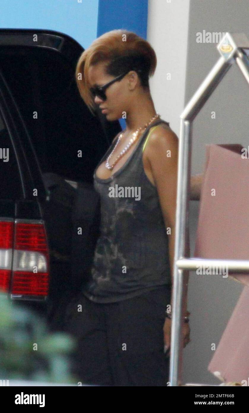 Rihanna leaves her Fort Lauderdale hotel. She is in town to sing at the