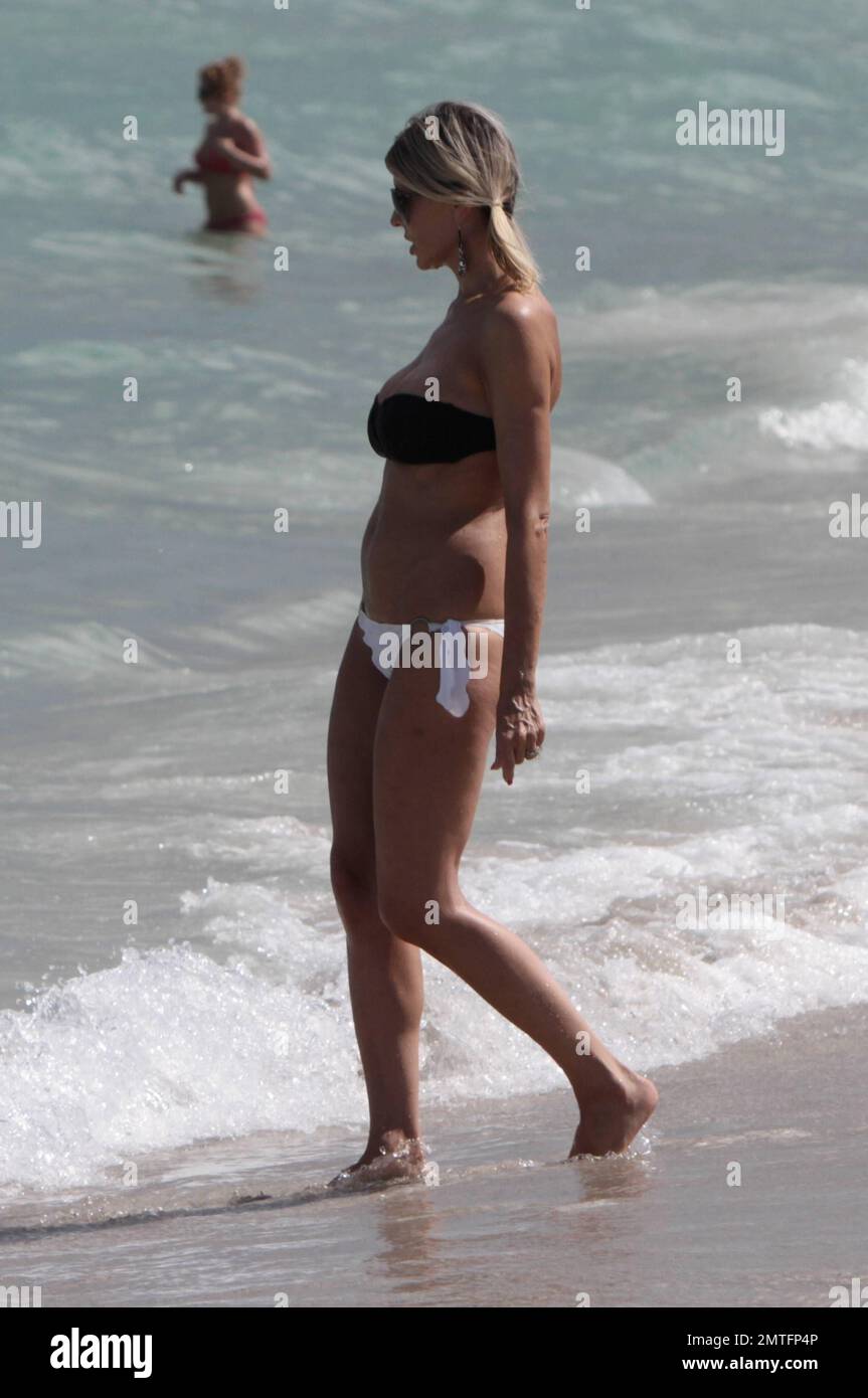Italian actress Rita Rusic seen relaxing in Miami Beach wearing a skimpy bikini. Miami, FL. 21 August 2011. Stock Photo