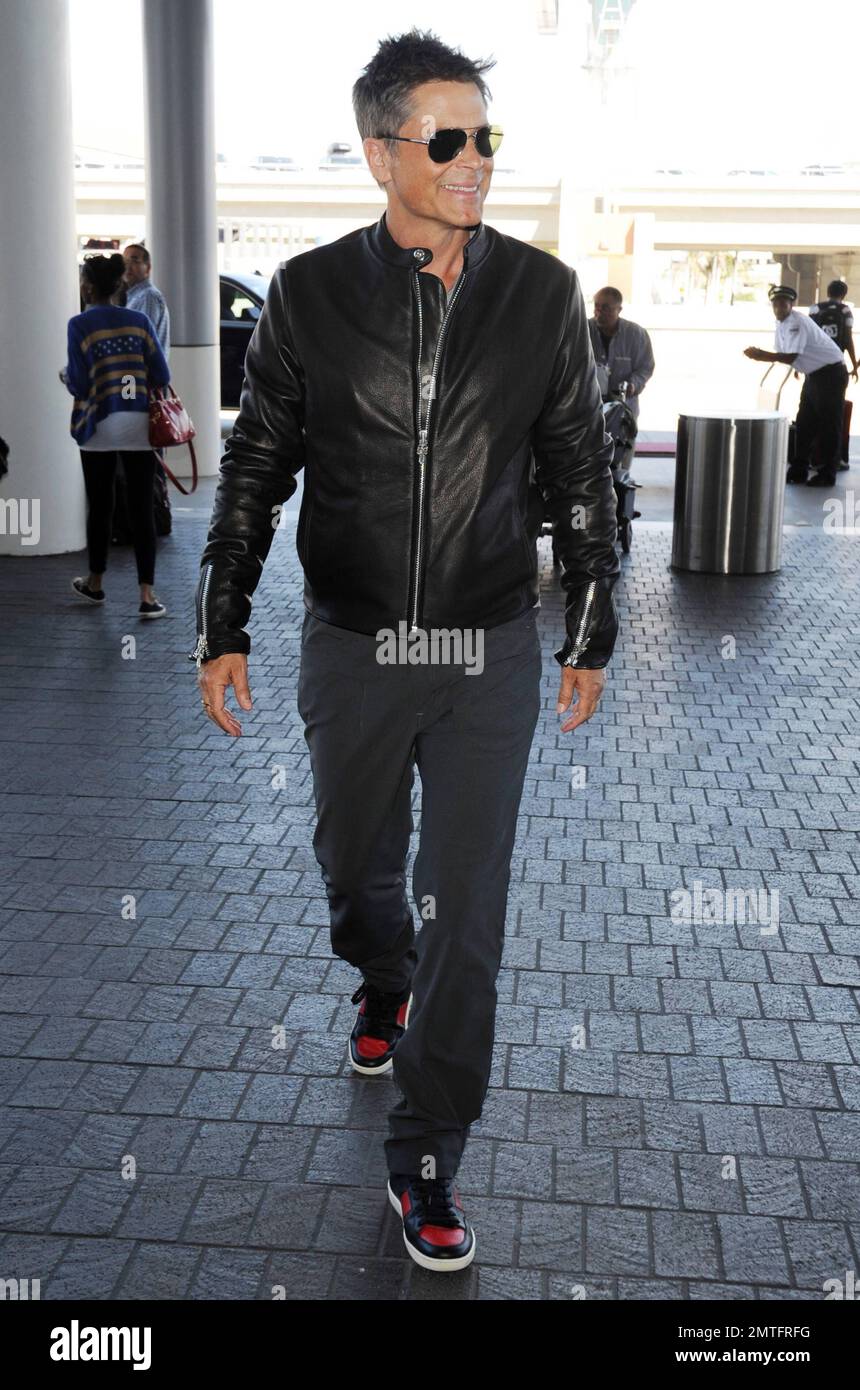 Sporting a fitted leather jacket, Rob Lowe is spotted in LAX airpot ahead  of Easter Sunday. Los Angeles, CA. April 4, 2015 Stock Photo - Alamy
