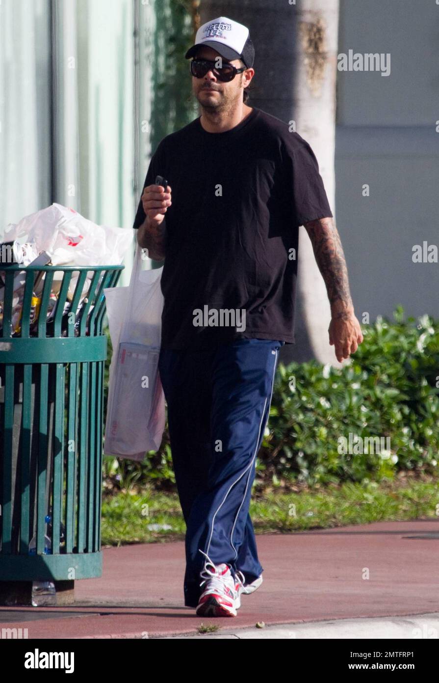 EXCLUSIVE!! Rob Patterson, boyfriend of Carmen Electra, shows off his  scruffy unshaven face while out and about Miami Beach in his sweats. Rob,  who is the guitarist for nu metal band Otep