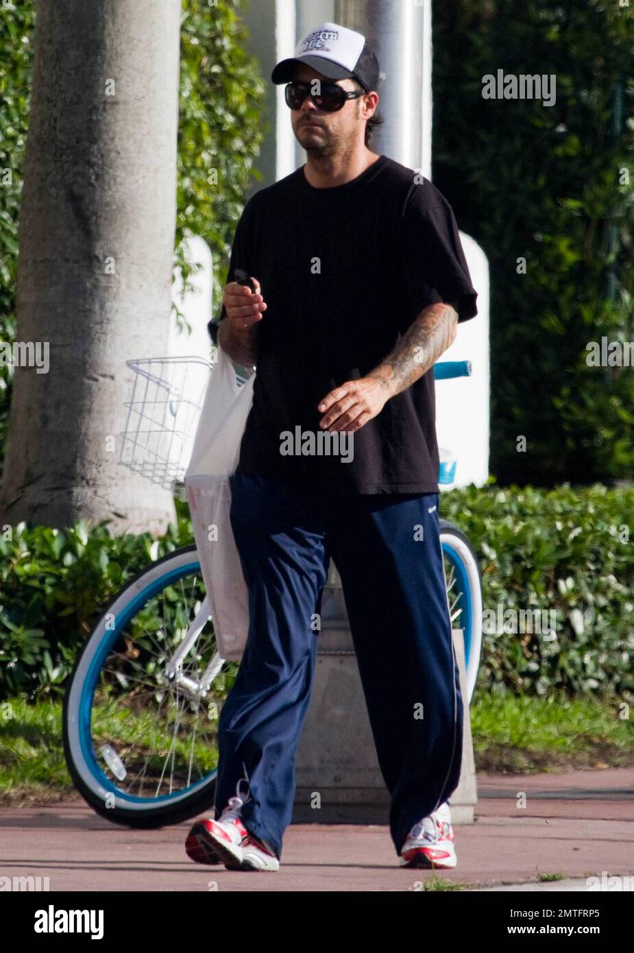 EXCLUSIVE!! Rob Patterson, boyfriend of Carmen Electra, shows off his  scruffy unshaven face while out and about Miami Beach in his sweats. Rob,  who is the guitarist for nu metal band Otep