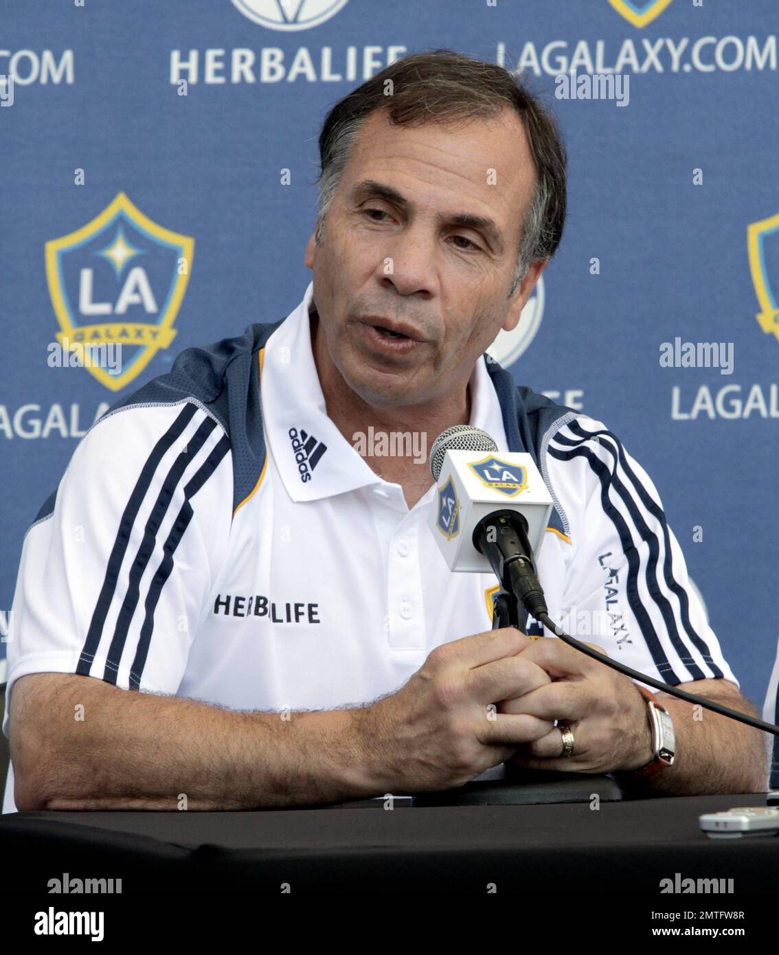 LA Galaxy head coach Bruce Arena with players Robbie Keane, Landon