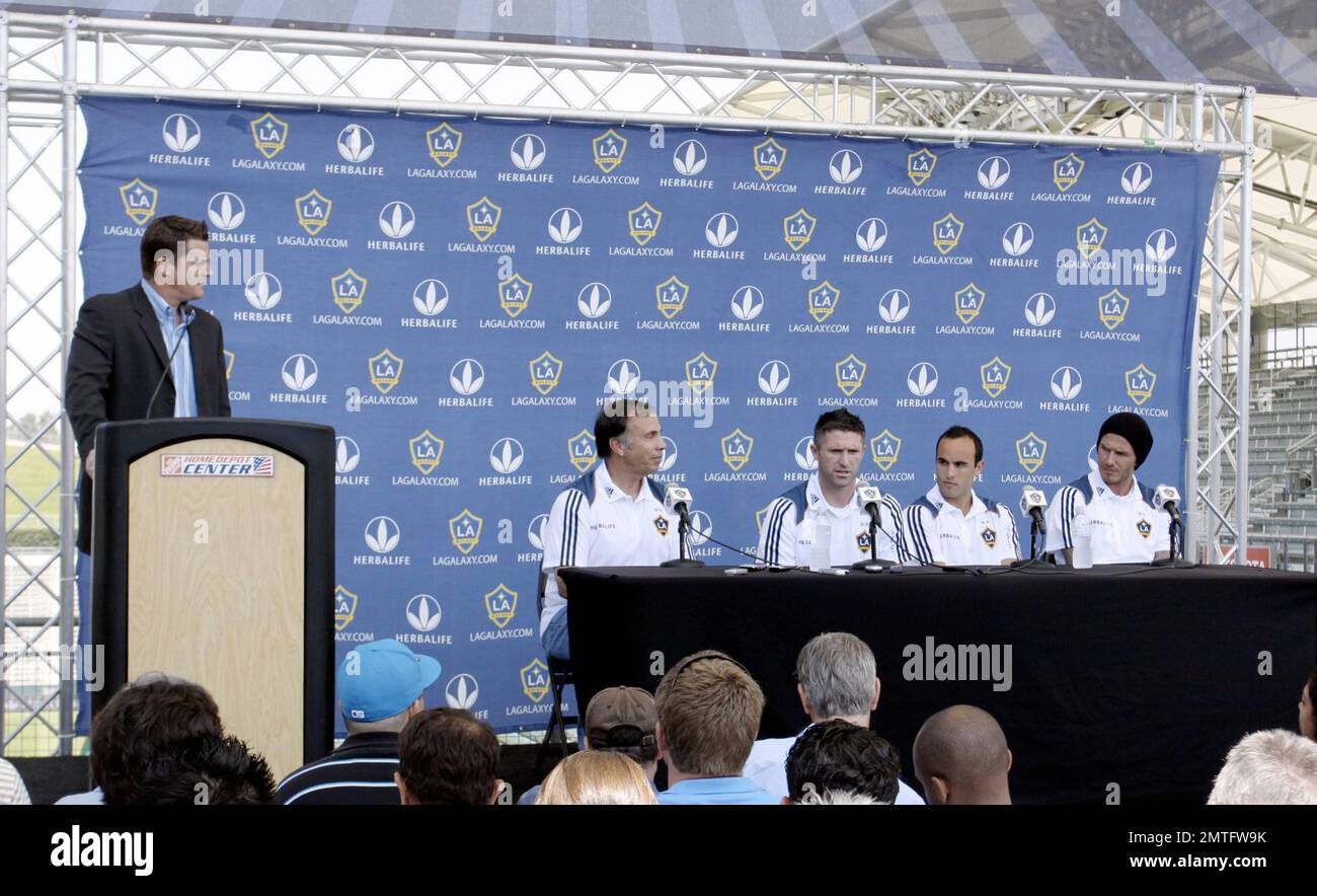 LA Galaxy head coach Bruce Arena with players Robbie Keane, Landon