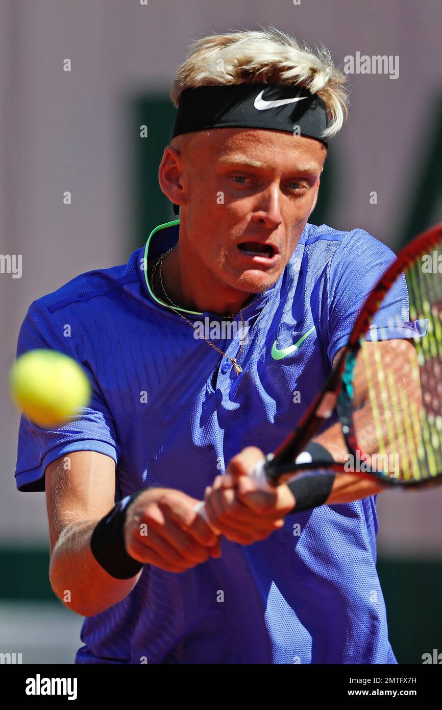 Spain's Nicola Kuhn plays a shot against Australia's Alexei Popyrin during  their boys' final match of the French Open tennis tournament at the Roland  Garros stadium, in Paris, France, Saturday, June 10,