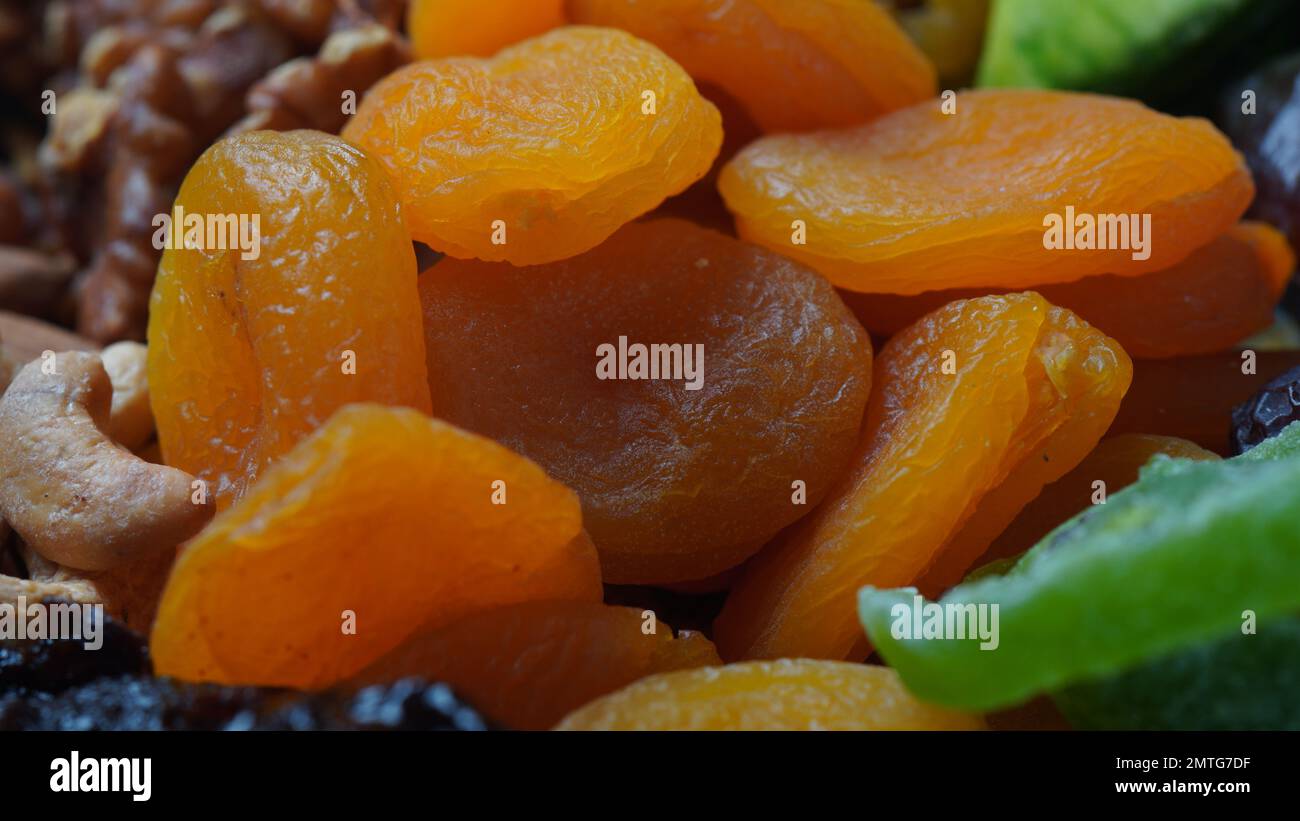 Dried apricots and assorted dry fruits Dry plum, kiwi, raisins, nuts