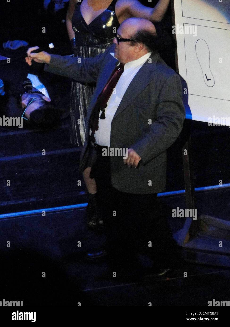 Danny DeVito performs in the one-night-only, star-studded 35th Anniversary Tribute and Costume Ball for 'The Rocky Horror Picture Show' at The Wiltern. The event, produced by Lou Adler and Kevin Duncan and directed by Kenny Ortega, benefited The Painted Turtle, one of Paul Newman's Hole in the Wall Gang Camps, which provides children throughout California who suffer from chronic and life-threatening illnesses the opportunity to rediscover the ordinary joys of being a child through a year-round camp and hospital outreach programs. Los Angeles, CA. 10/28/10.  . Stock Photo