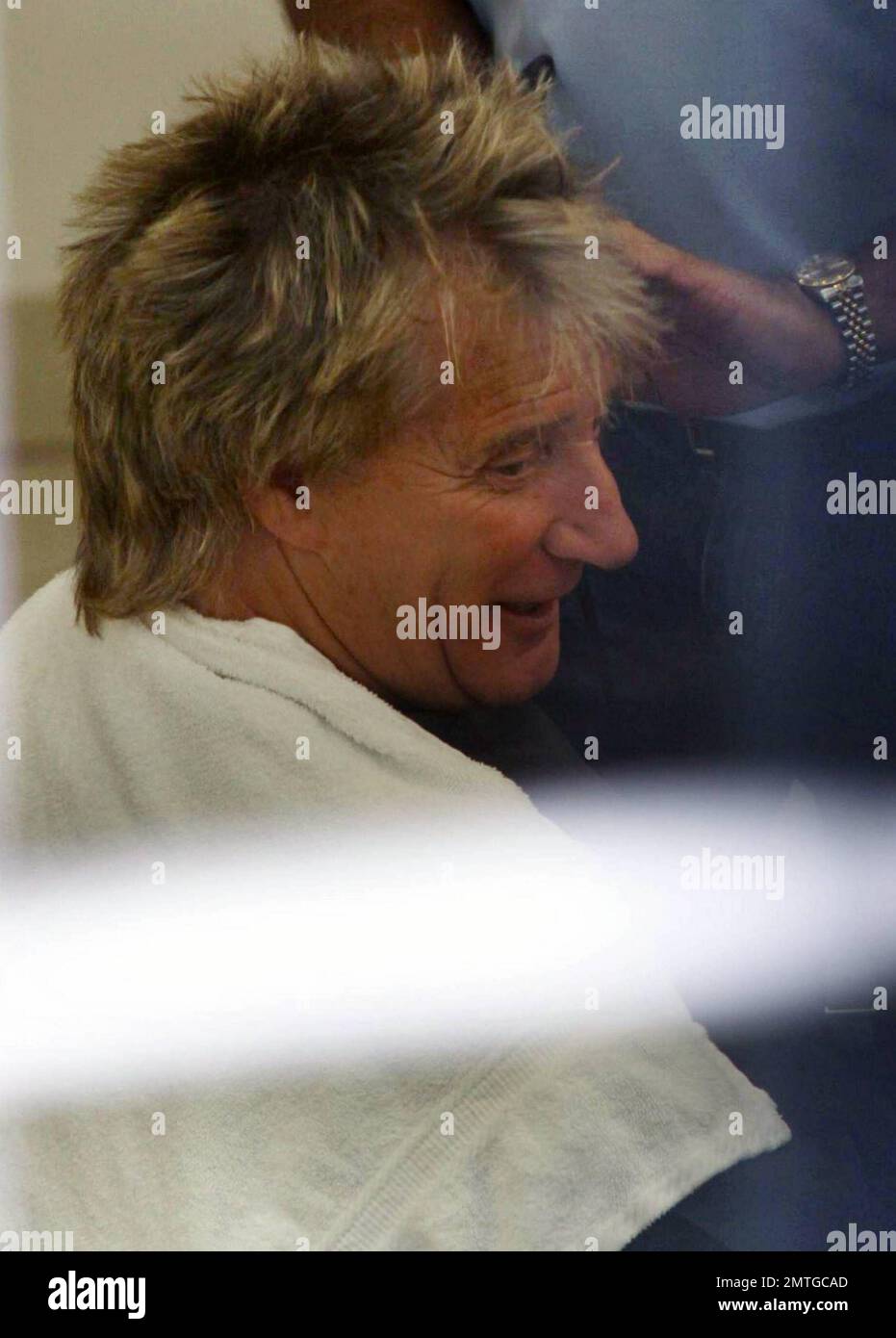 EXCLUSIVE!! Legendary pop rock singer Rod Stewart stops by at world  renowned hair stylist Daniel Galvin's salon to get his hair cut. Stewart,  who is set to become the father of his