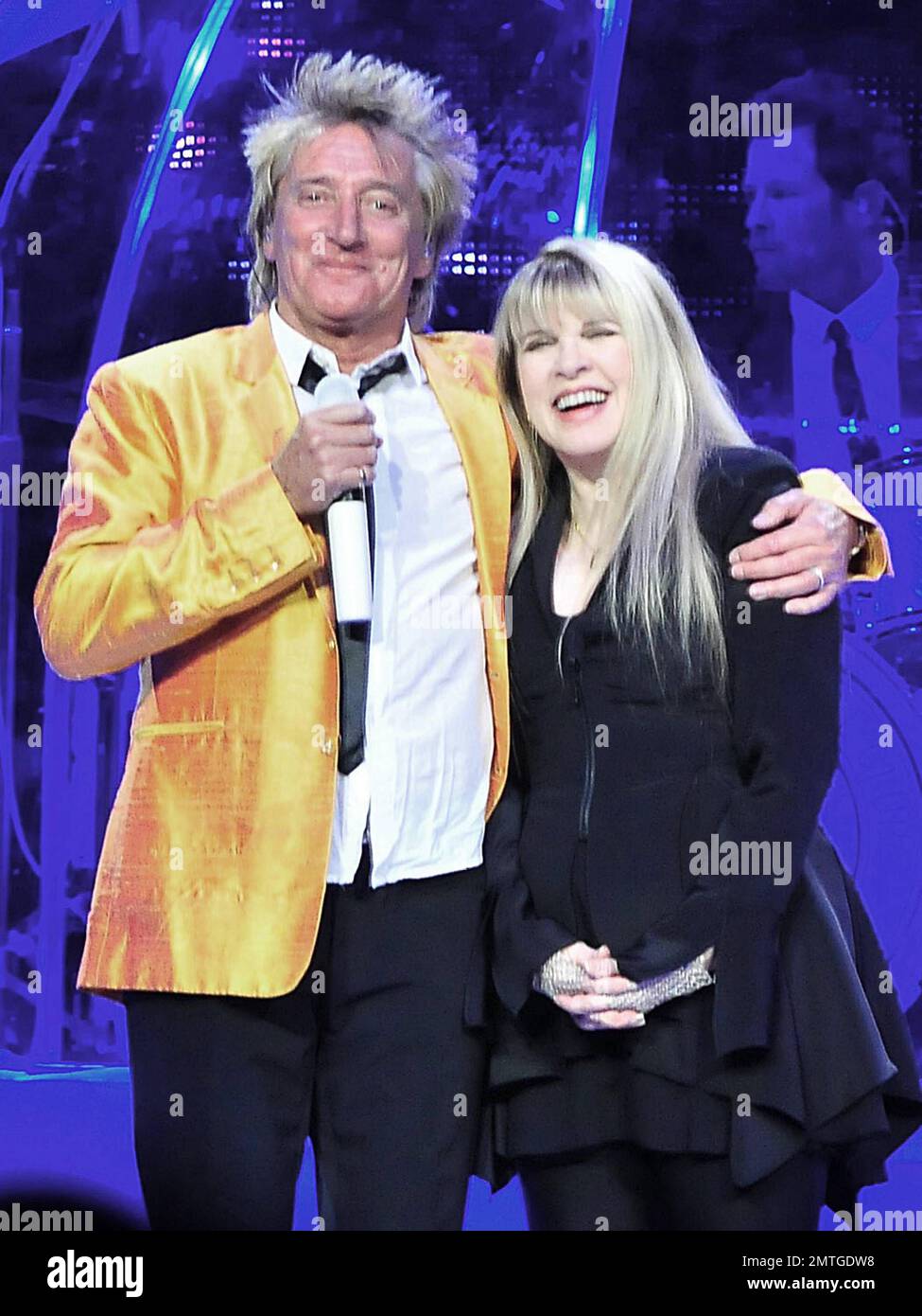 Rod Stewart and Stevie Nicks perform live solo acts and duet at Madison  Square Garden. During his performance Stewart, 66, father of eight  including two youngsters appeared tired at times, holding his