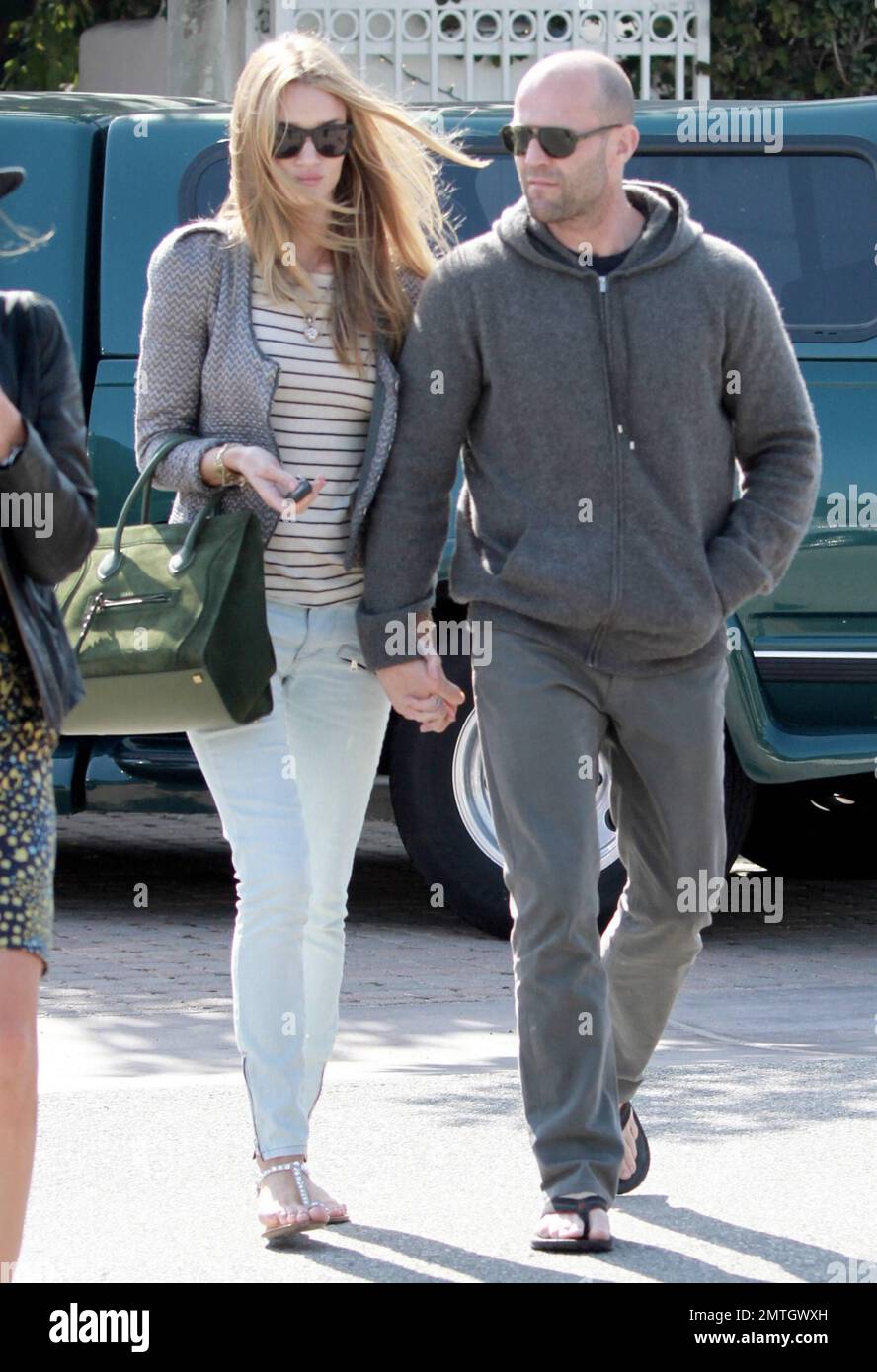 Rosie Huntington-Whiteley and boyfriend Jason Statham were seen leaving