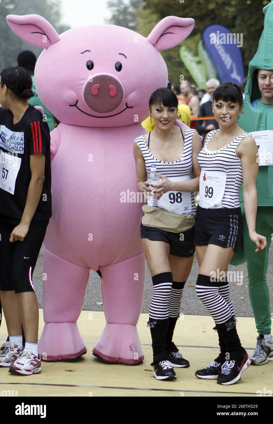 The Cheeky Girls take part in the Royal Parks Foundation Half Marathon at Hyde Park in London, UK. 10/10/10.  . Stock Photo