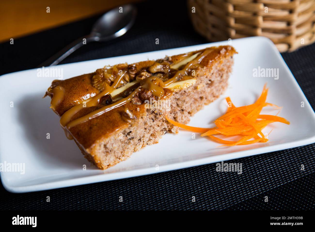 Sponge cake with nuts in a French patisserie Stock Photo Alamy