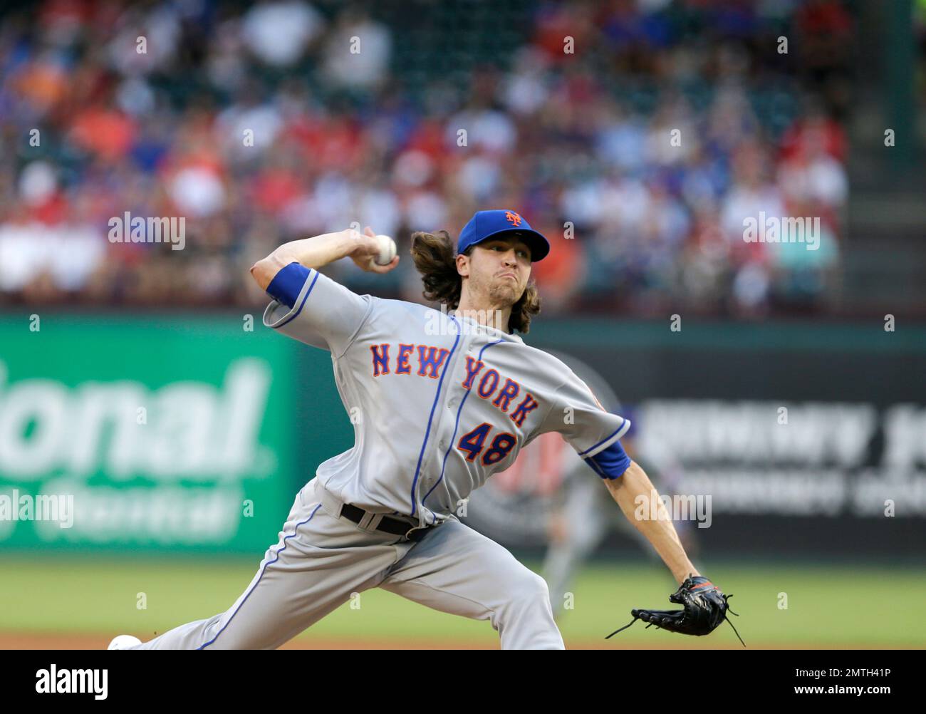 New York Mets starting pitcher Jacob deGrom throws to the Texas Rangers in  the first inning of interleague baseball game, Tuesday, June 6, 2017, in  Arlington, Texas. (AP Photo/Tony Gutierrez Stock Photo 