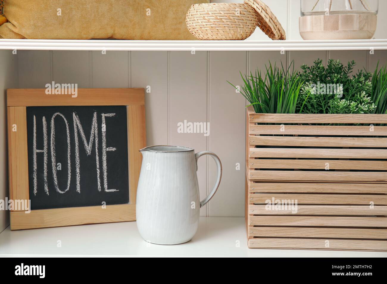 White shelving unit with different decorative stuff Stock Photo Alamy
