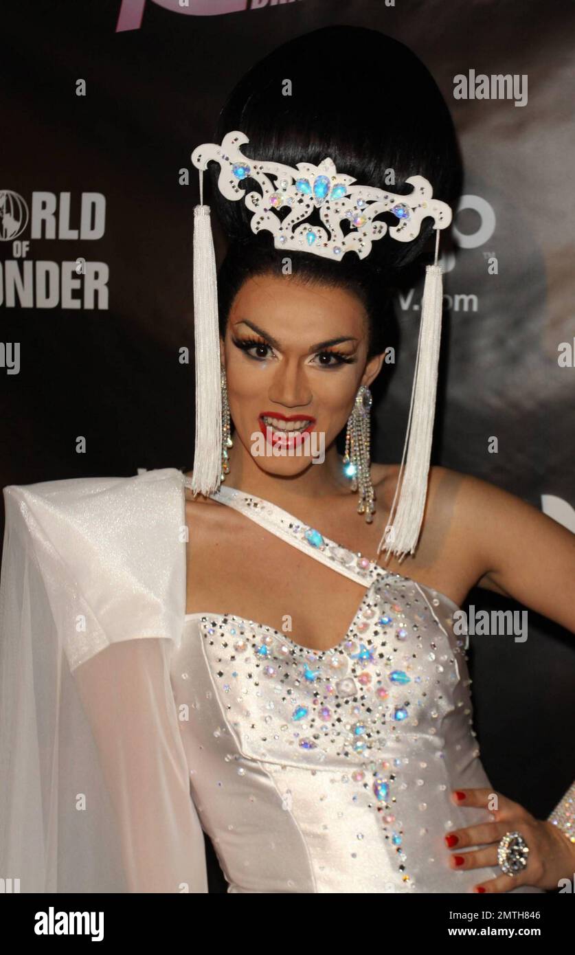 Drag queen Manilla Luzon poses for photographers on the red carpet at