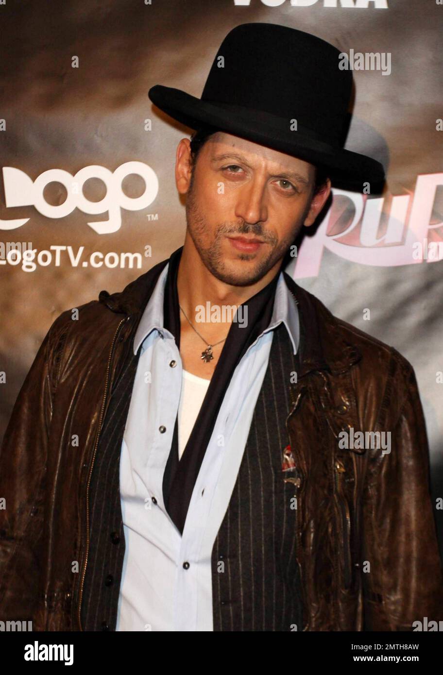 Fashion designer Santino Rice poses for photographers on the red carpet ...