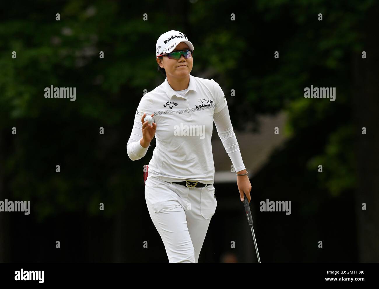 Jeong Eun Lee, of South Korea, reacts after saving par on the sixth ...