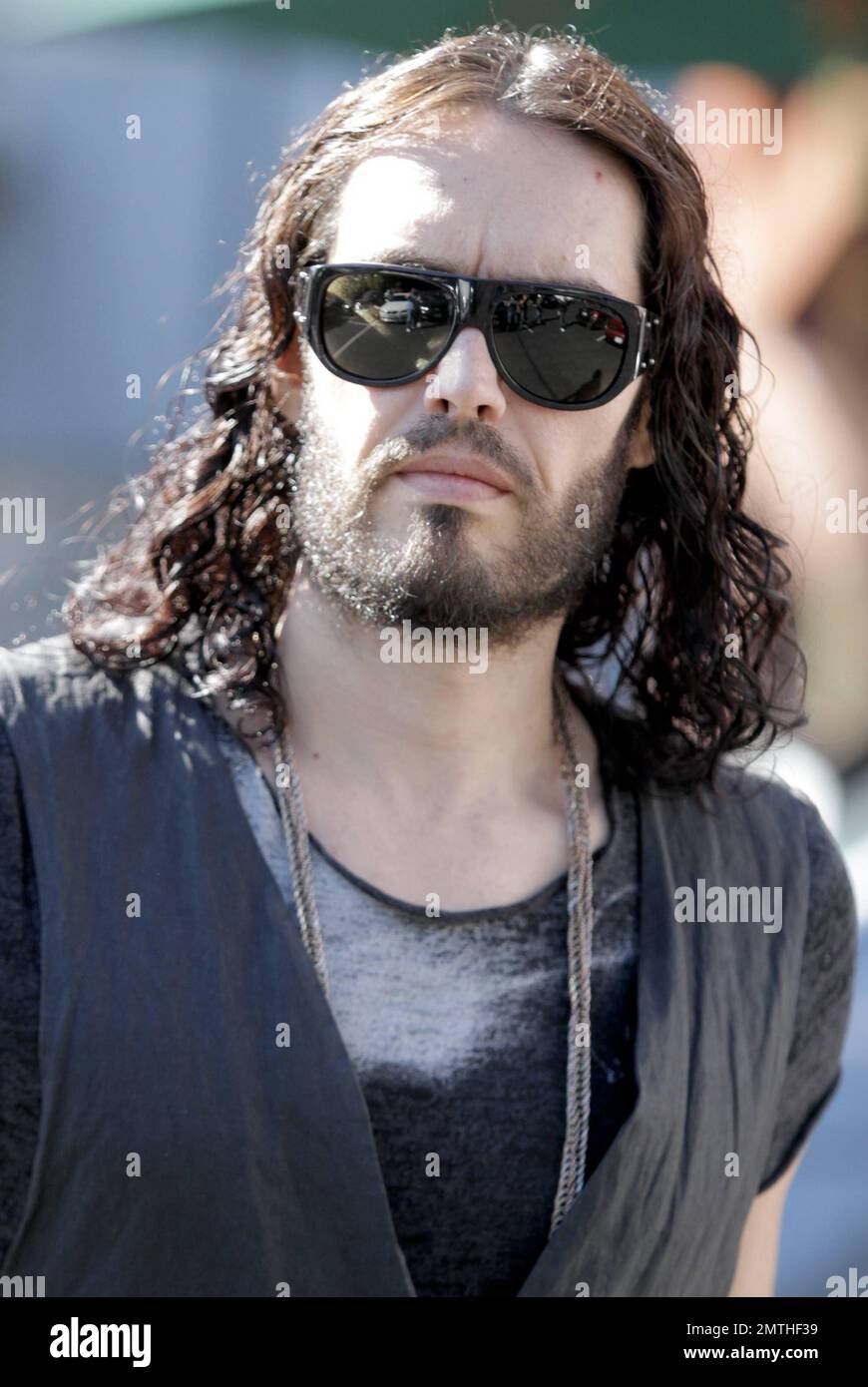 Comedian Russell Brand was spotted out in West Hollywood appearing as if he  had just stepped out of the shower dressed in all black with grey boots and  dark shades. Brand, who