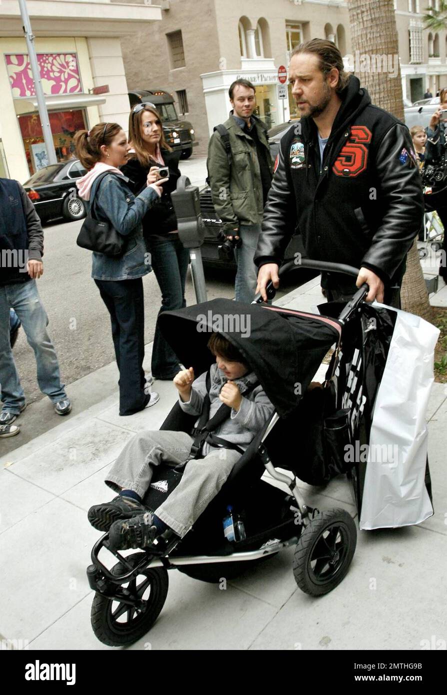 Russell Crowe shows he is a hands-on dad during a shopping spree in LA ...