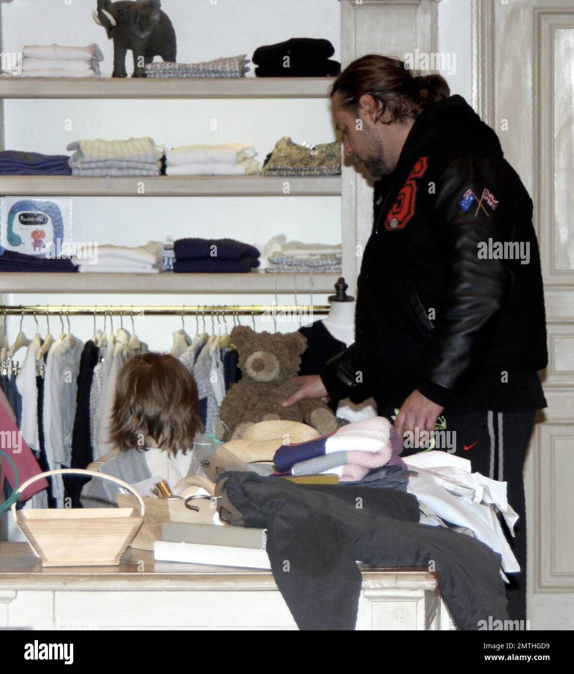 Russell Crowe shows he is a hands-on dad during a shopping spree in LA ...