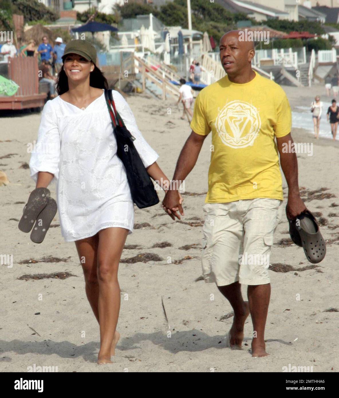 Russell Simmons and new girlfriend spend the day at beach parties
