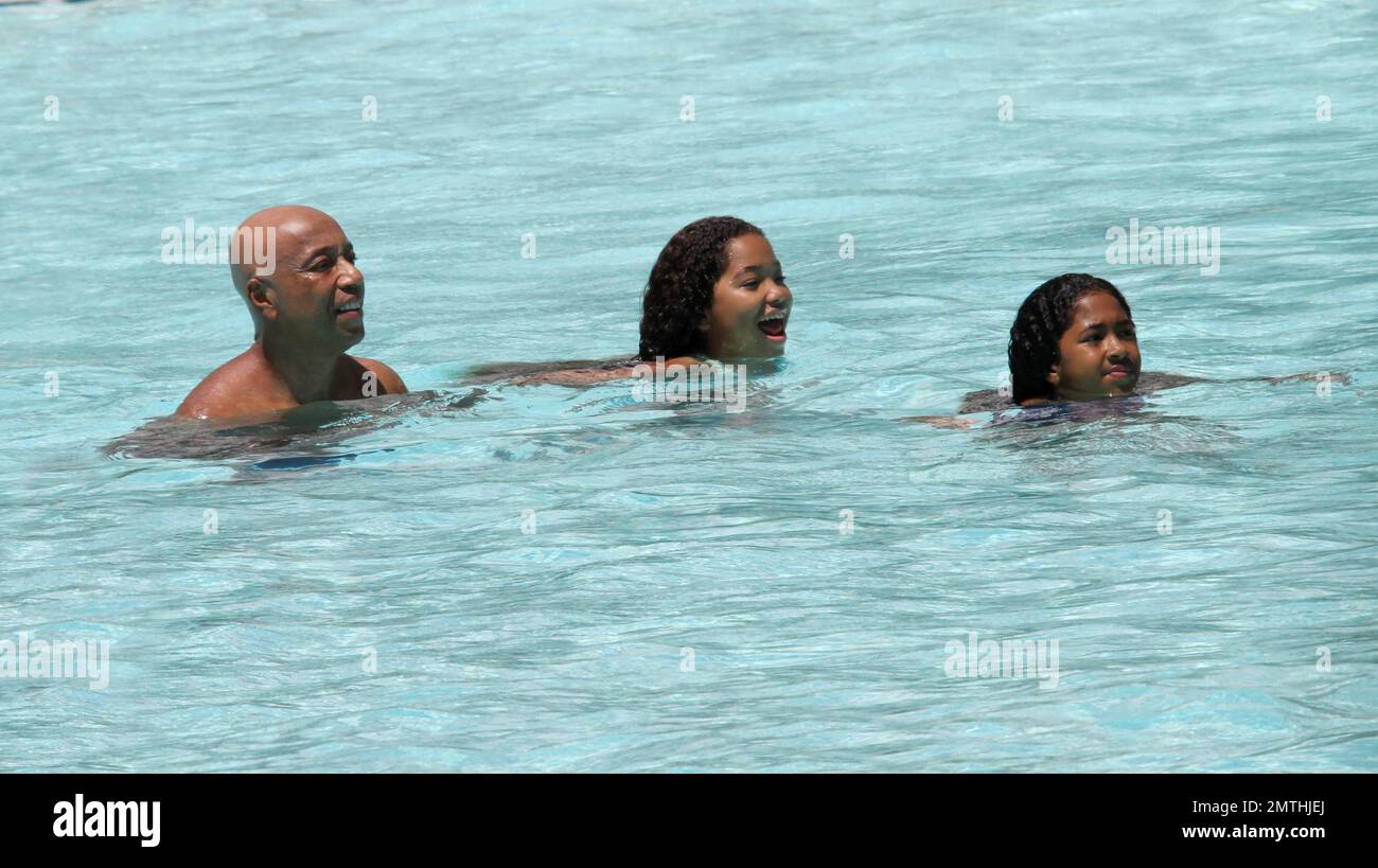 Hip hop mogul Russell Simmons spends a day at the beach with daughters ...
