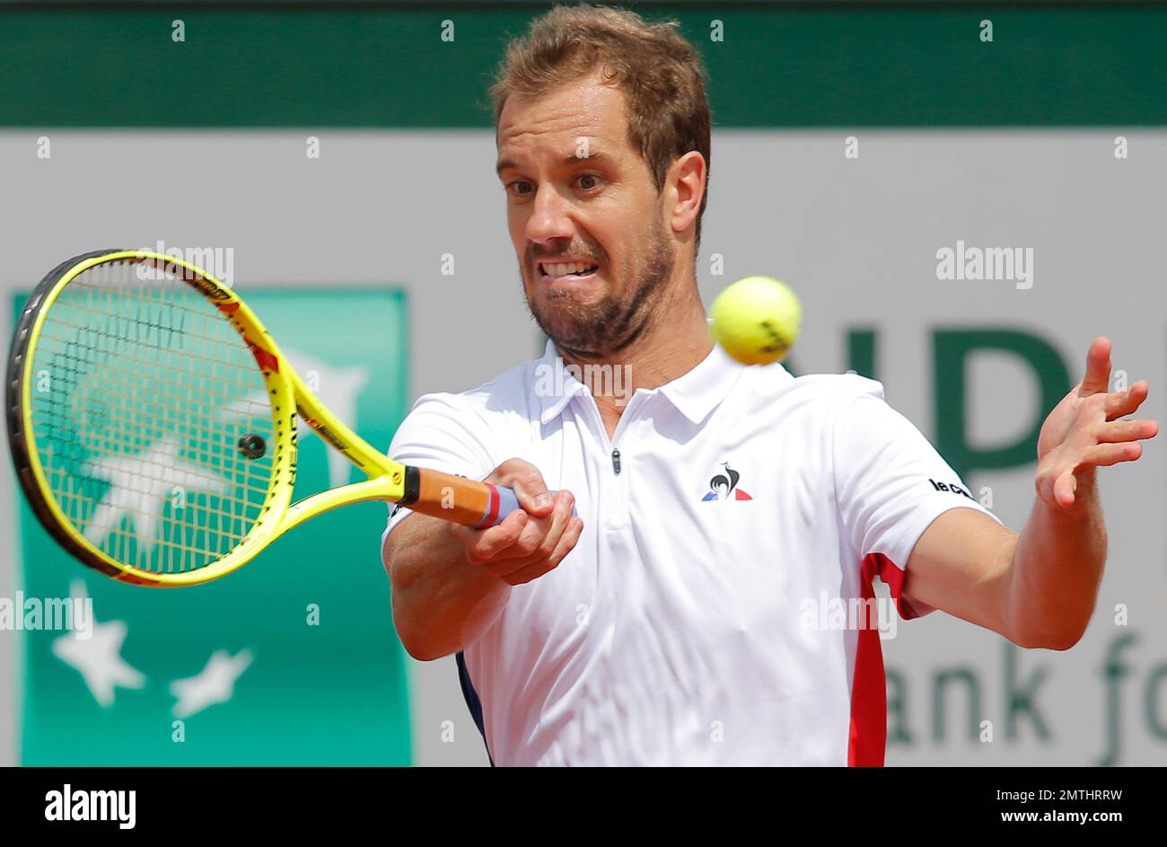 France's Richard Gasquet plays a shot in his third round match against  France's Gael Monfils at the French Open tennis tournament at the Roland  Garros stadium, in Paris, France. Sunday, June 4,