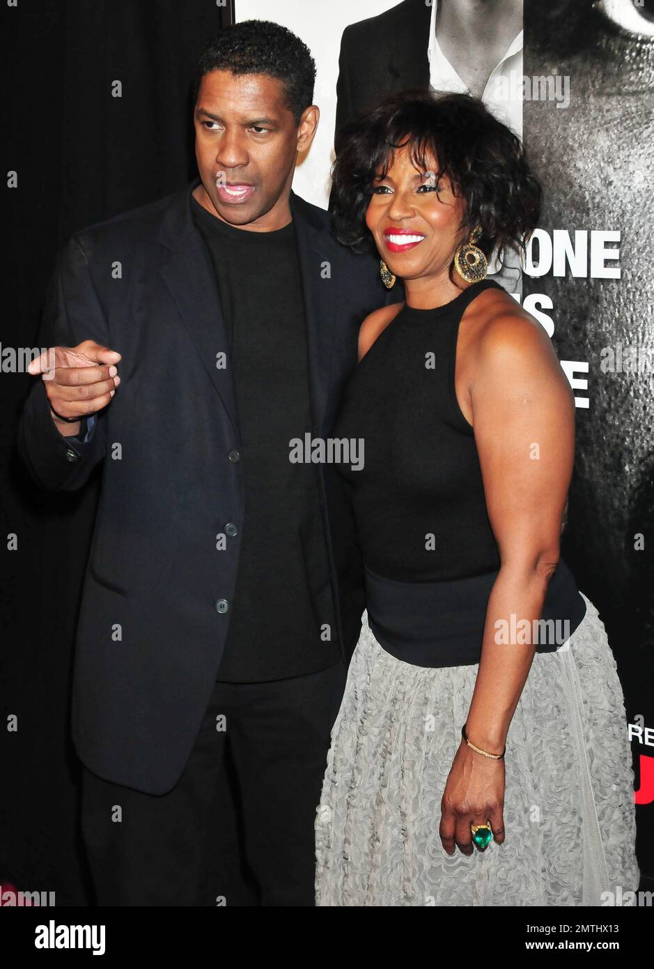 Denzel Washington and wife at the premiere of "Safe House" held at the