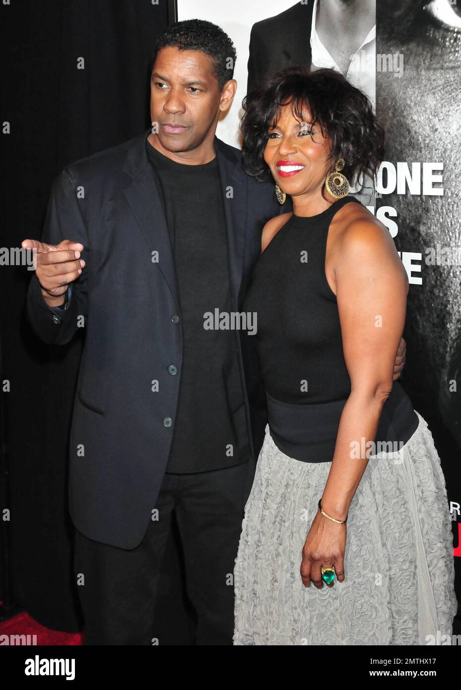 Denzel Washington and wife at the premiere of "Safe House" held at the