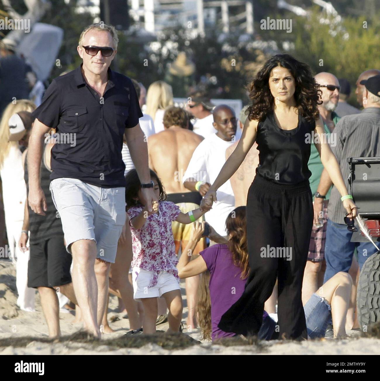 EXCLUSIVE!! Actress Salma Hayek, husband Francois-Henri Pinault and  daughter Valentina end their Fourth of July holiday with a family walk on  the beach. Malibu, CA. 7/4/11 Stock Photo - Alamy