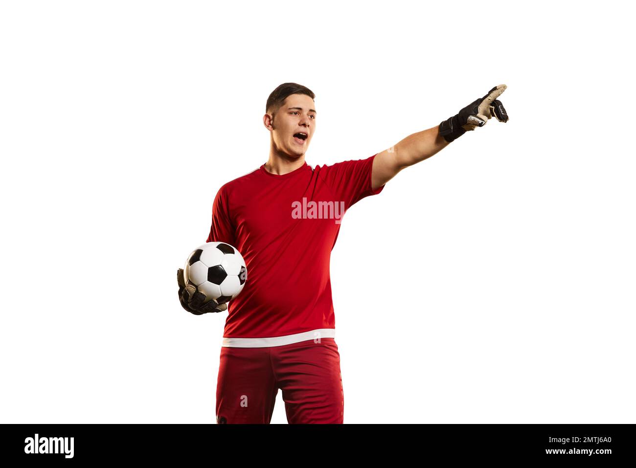 Professional soccer football goalkeeper in action, motion isolated over